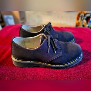 Doc Martens canvas shoes.